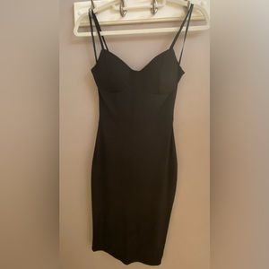 Rather sexy, stretchy black dress, size Small